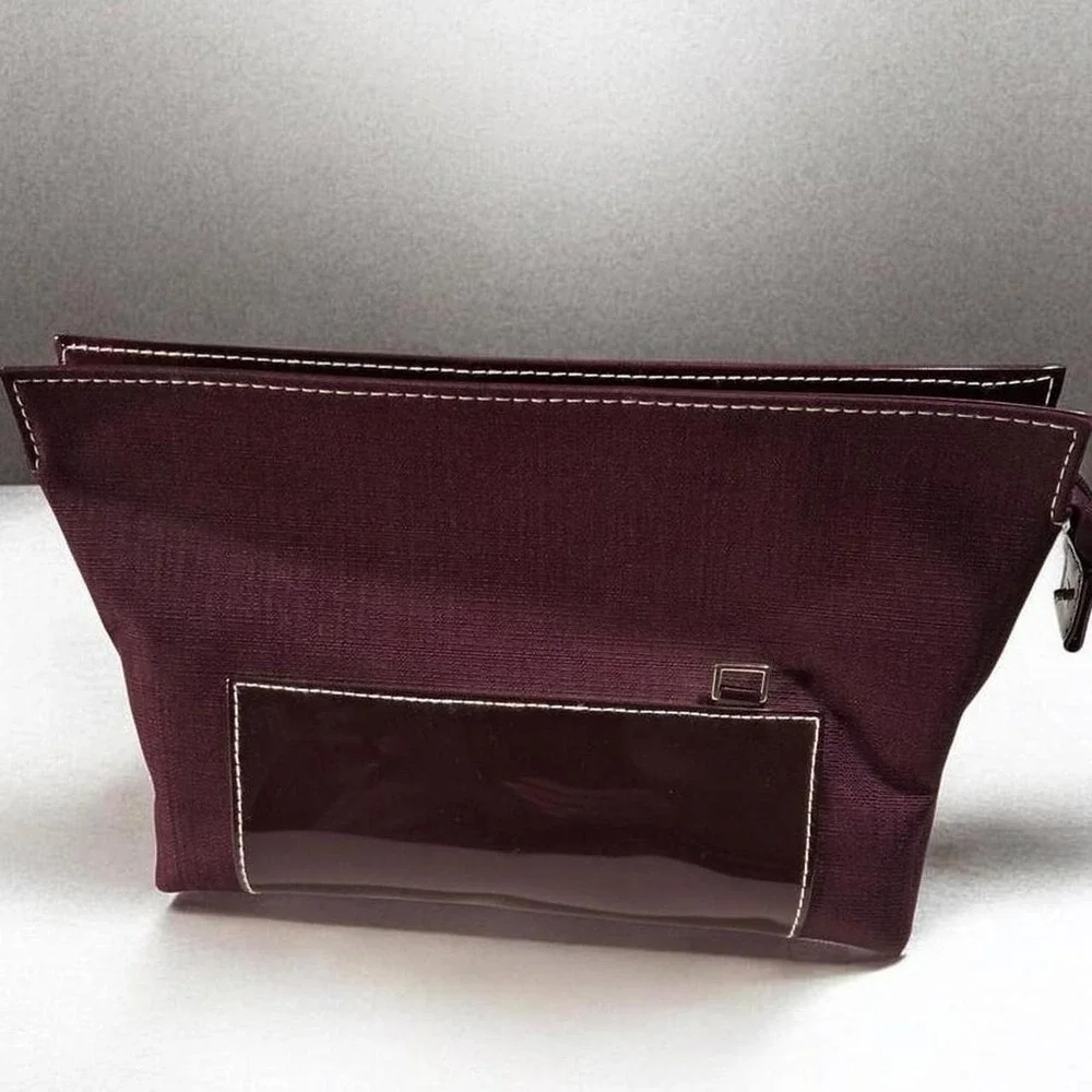 Womens Estee Lauder purple/ cranberry color makeup bag new beautiful color